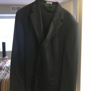 Blue pinstriped 3 button suit.  Geoffrey Beene